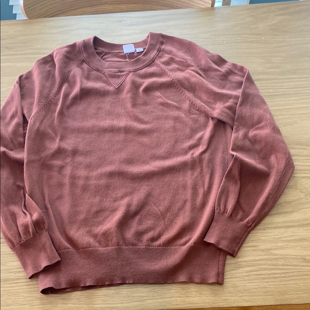 Cute cotton sweater in rust color. Size XS.